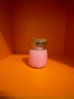 Pink Colored, Orange Scented Candle